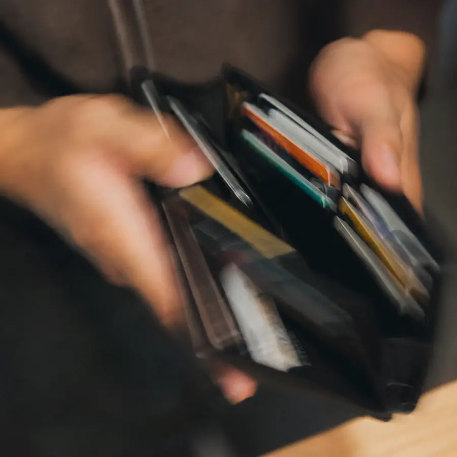 A wallet filled with payment cards